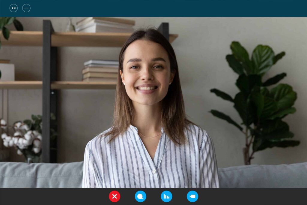 Head shot screen view smiling woman chatting online at home